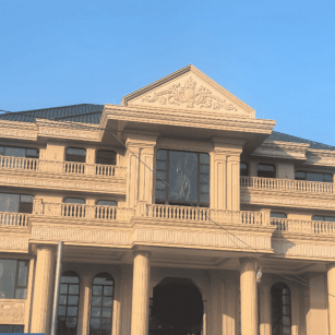 东莞黄金麻别墅外墙干挂石材效果示例