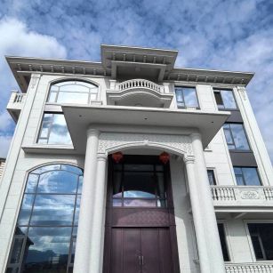 东莞白麻别墅外墙干挂石材效果示例